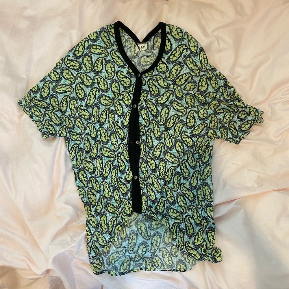 blue and green patterned shirt